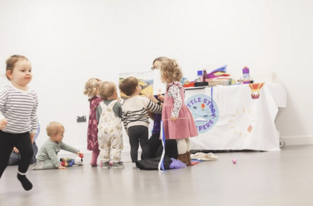 Children playing in a bright educational setting.